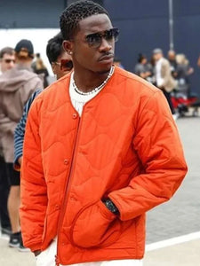 damson idris f1 the movie orange jacket