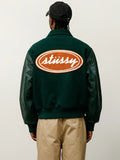 stussy script oval varsity jacket...