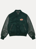 stussy script oval varsity jacket..