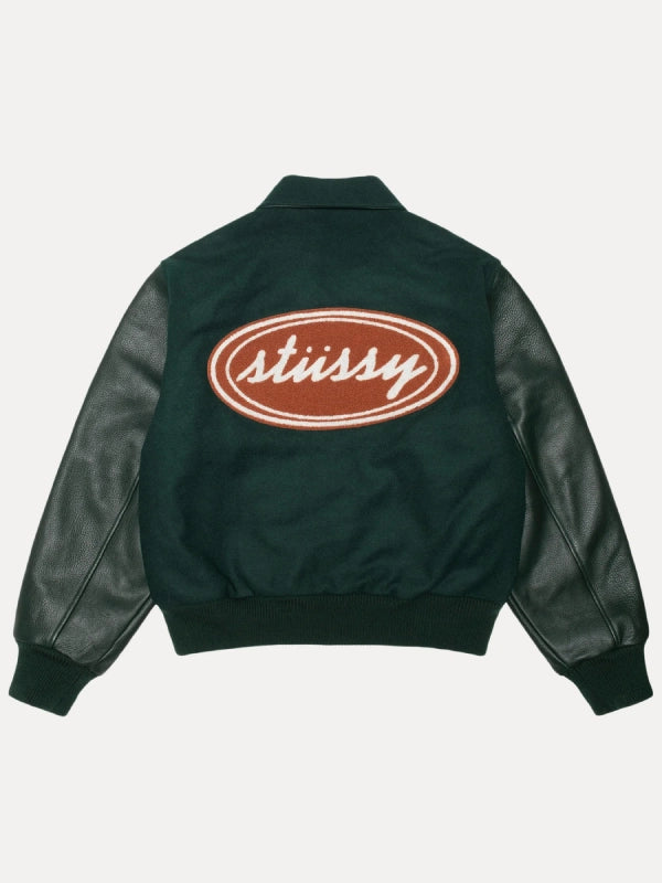stussy script oval varsity jacket.